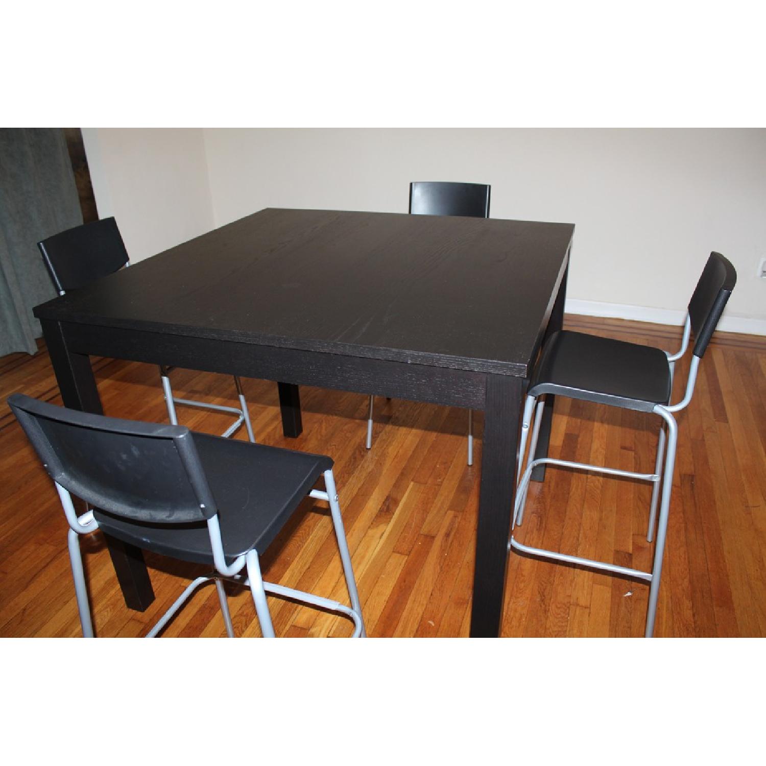 Ikea Bjursta Extendable Dining Table + 4 Stig Bar Stools - image-1