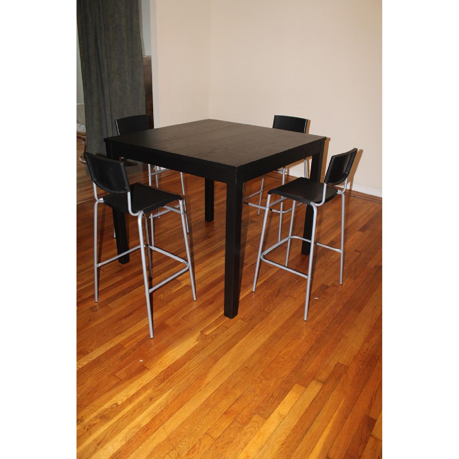 Ikea Bjursta Extendable Dining Table + 4 Stig Bar Stools - image-4