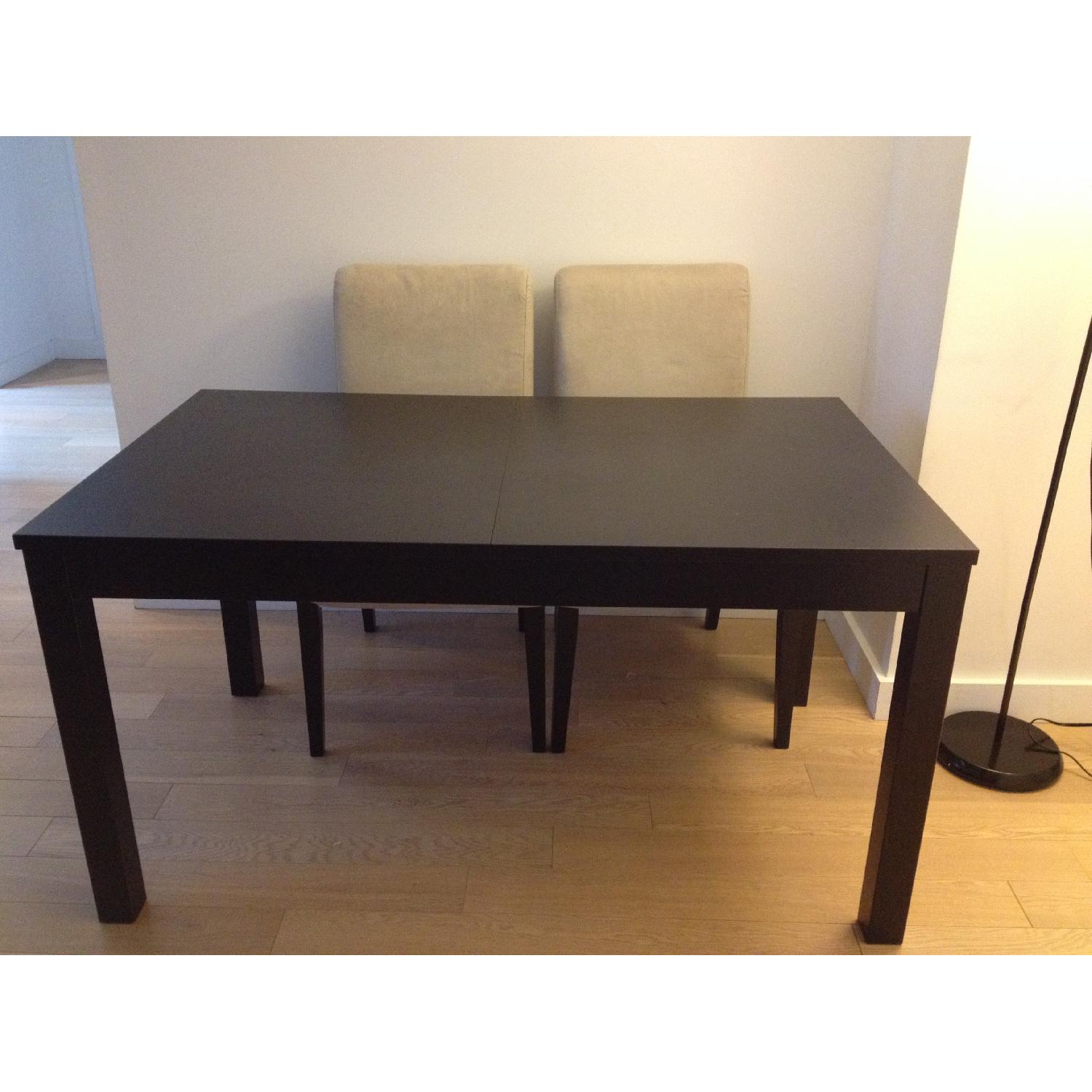 Ikea Bjursta BlackBrown Extendable Dining Table AptDeco