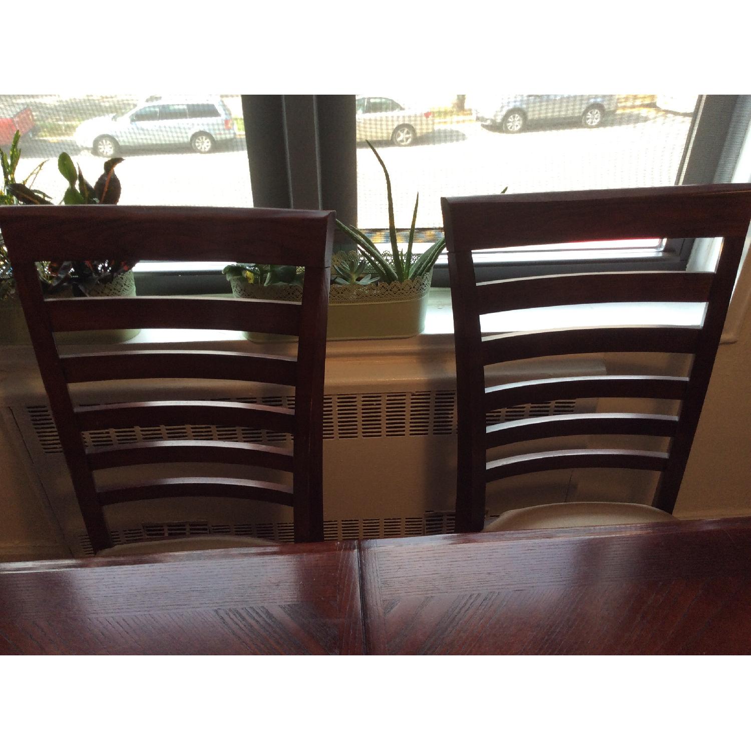 Cherry Wood Extendable Dining Table w/ 6 Chairs - AptDeco