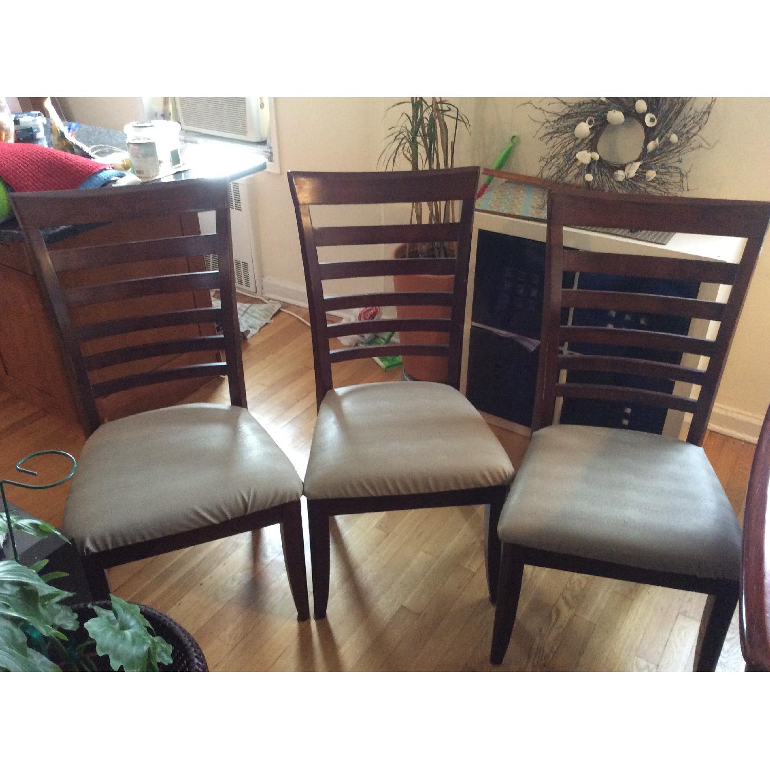 Cherry Wood Extendable Dining Table w/ 6 Chairs - AptDeco