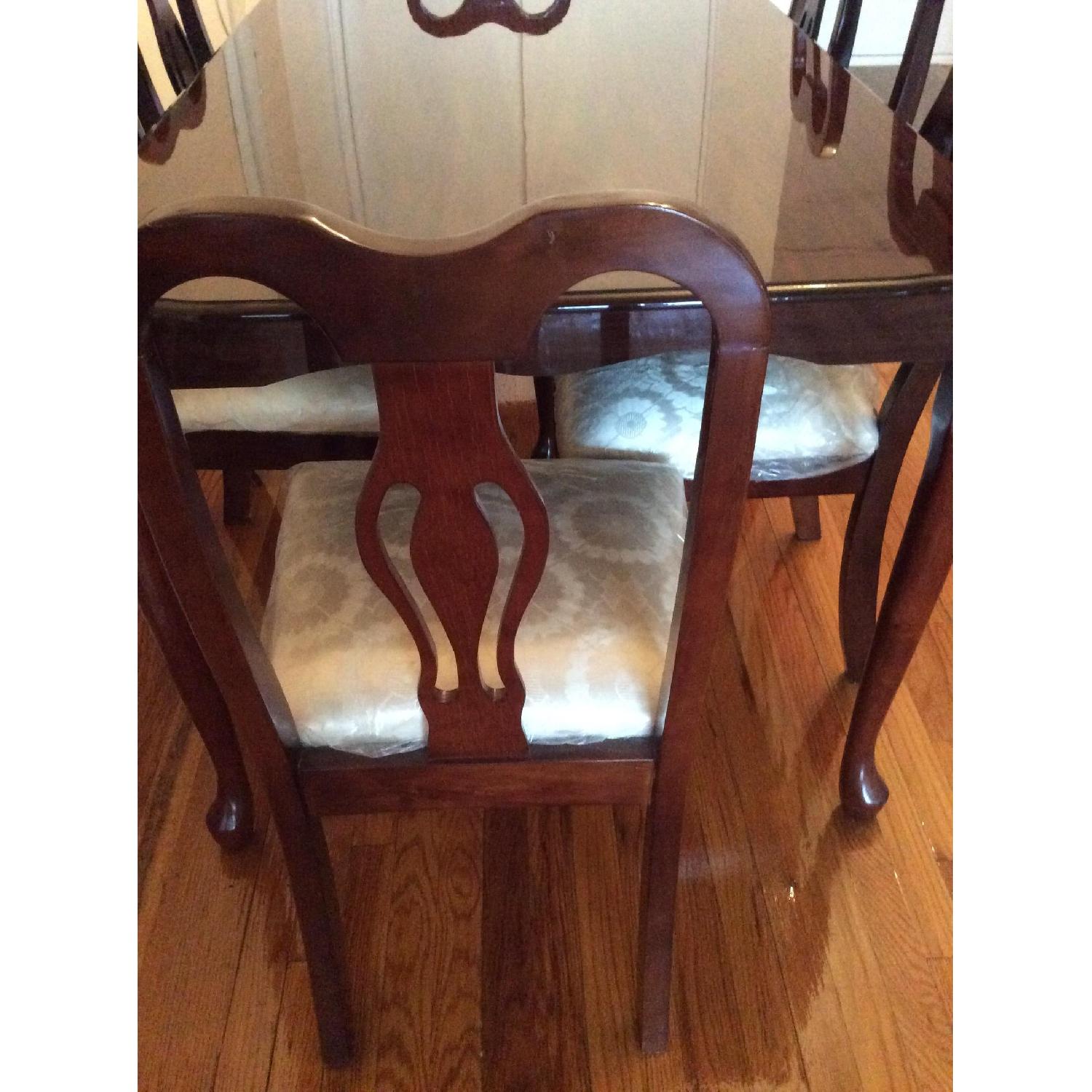 High Gloss Dark Cherry Dining Table w/ 6 Chairs in Ivory Upholstery AptDeco