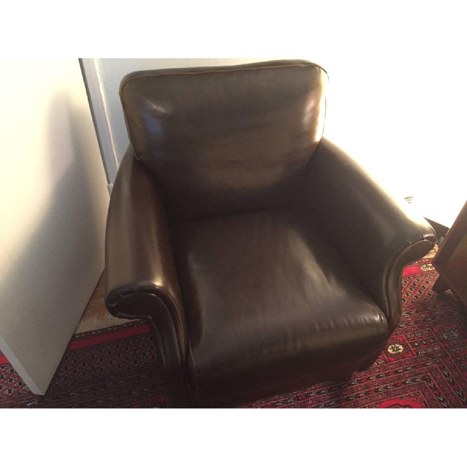 Raymour & Flanigan Brown Leather Armchair w/ Roll Arms AptDeco