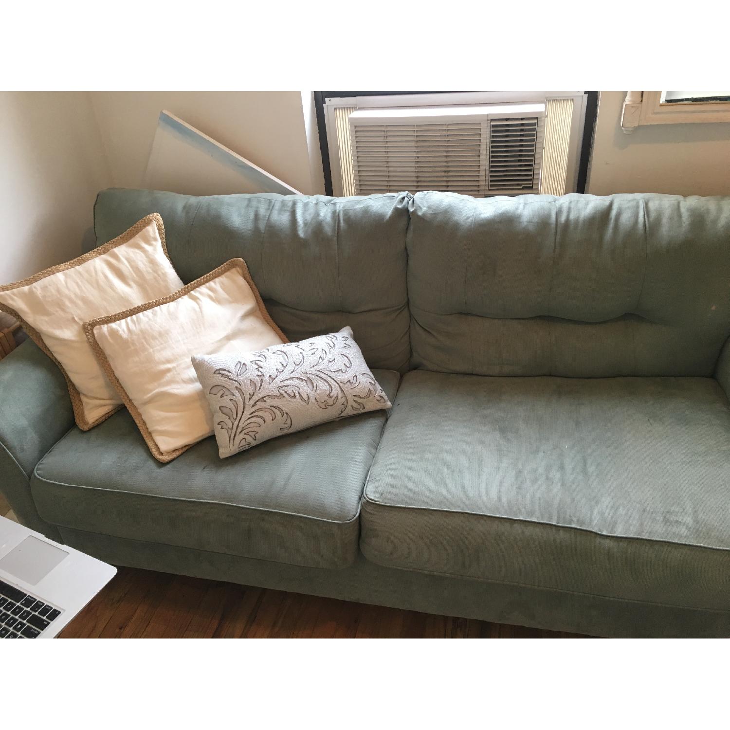 Ashley's Sage/Mint Green Sofa - image-1