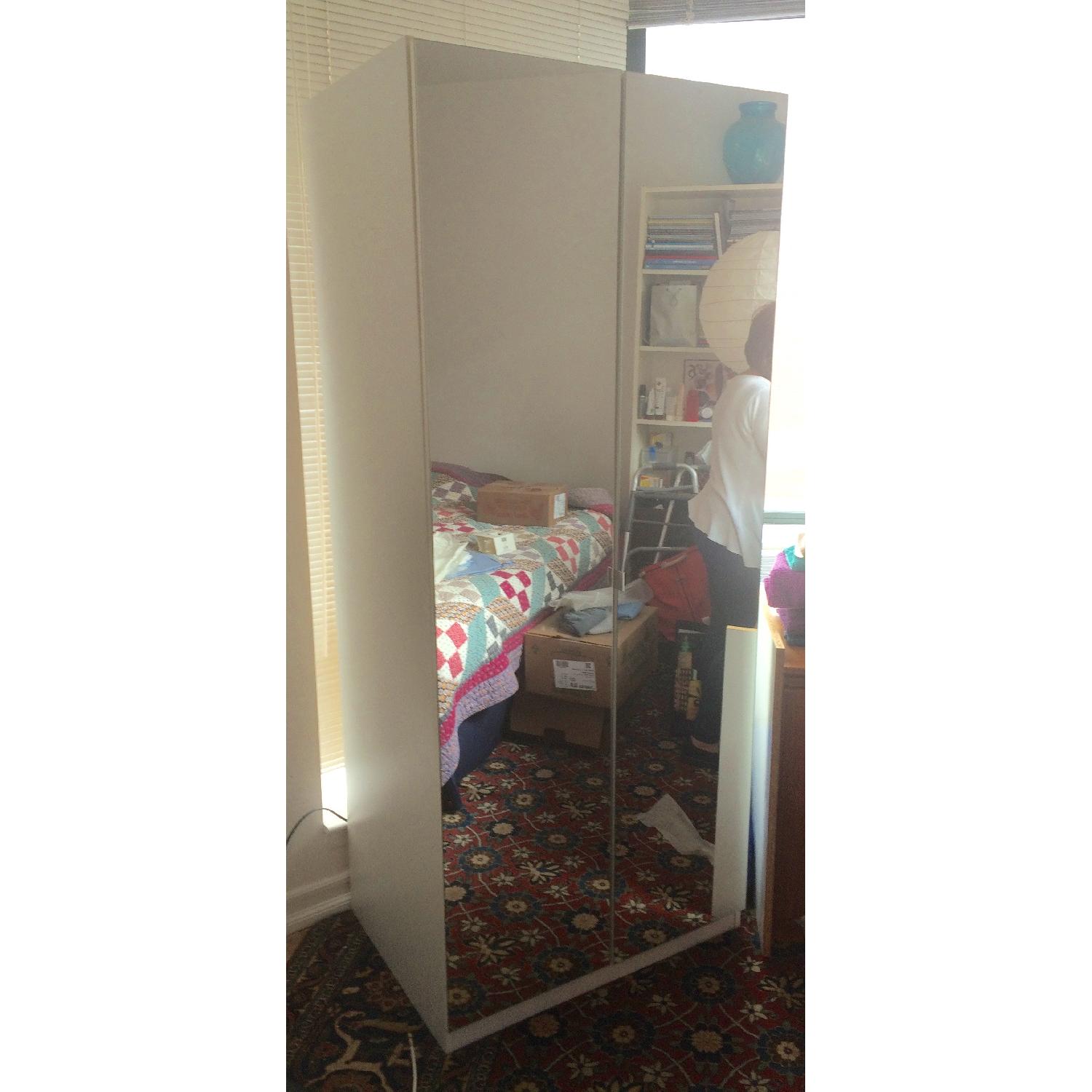 Bloomingdale's Mirrored Storage w/ Adjustable shelves AptDeco