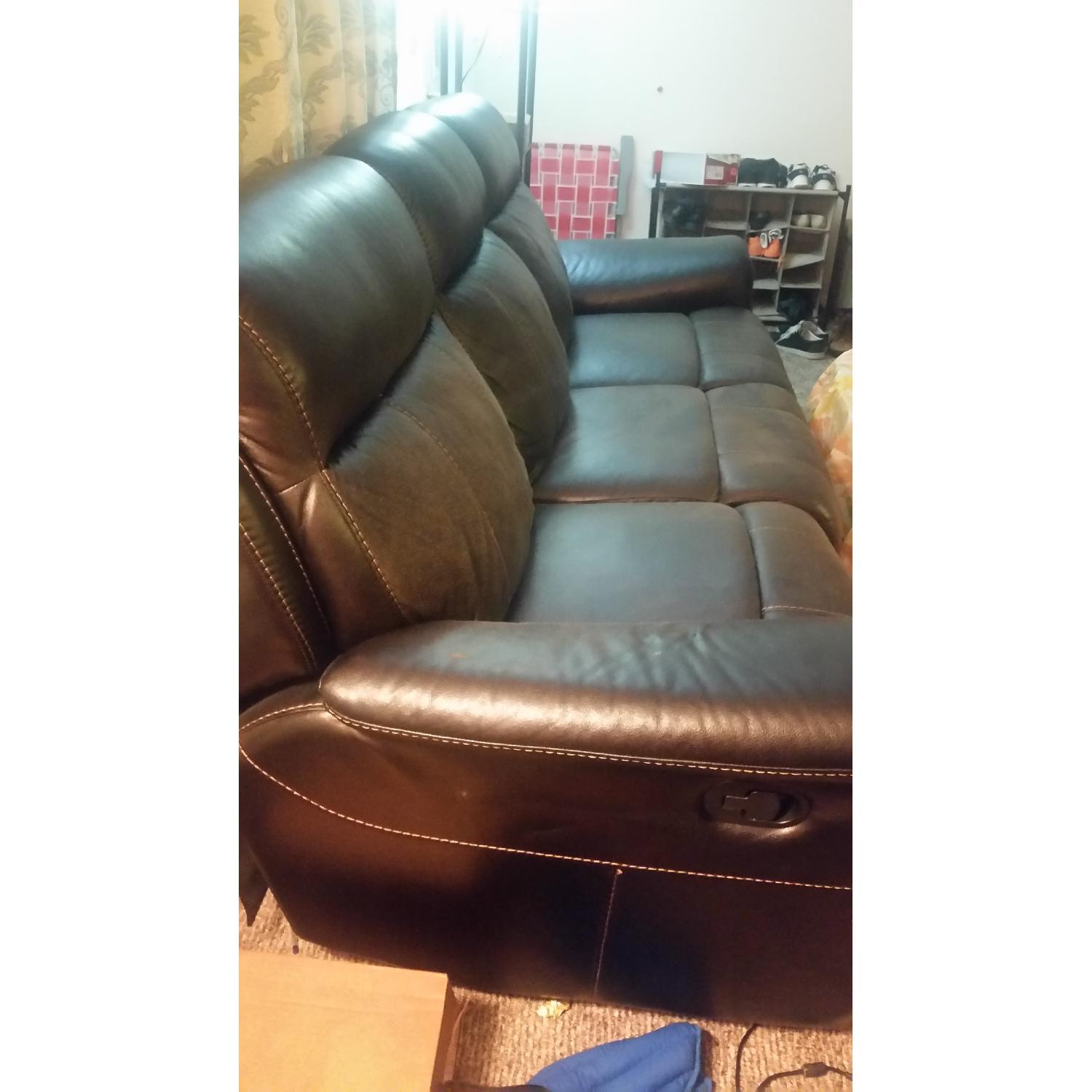 Raymour & Flanigan Toby Microfiber Faux Leather Reclining Sofa AptDeco