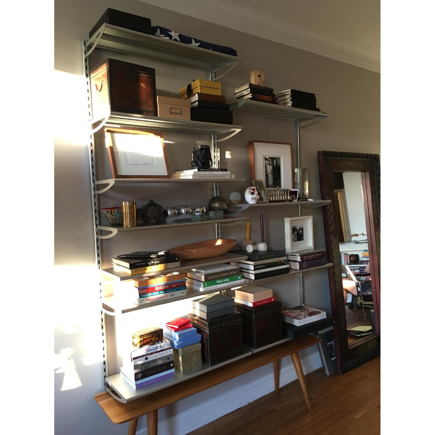 CB2 Wall Mounted Adjustable Bookcase/Shelving AptDeco