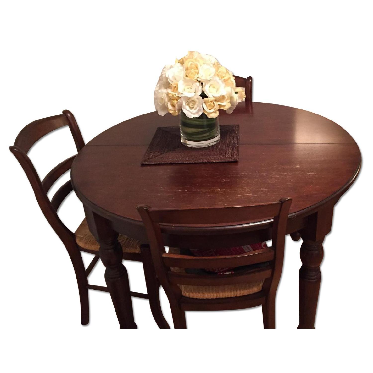 Pottery Barn Round Extending Dining Room Table w/ 4 Chairs - image-4