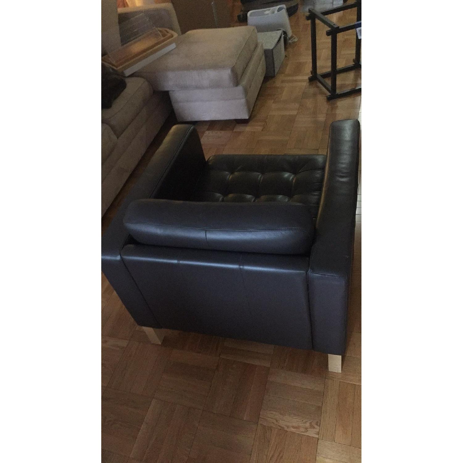 Ikea Leather Armchair & Ottoman AptDeco