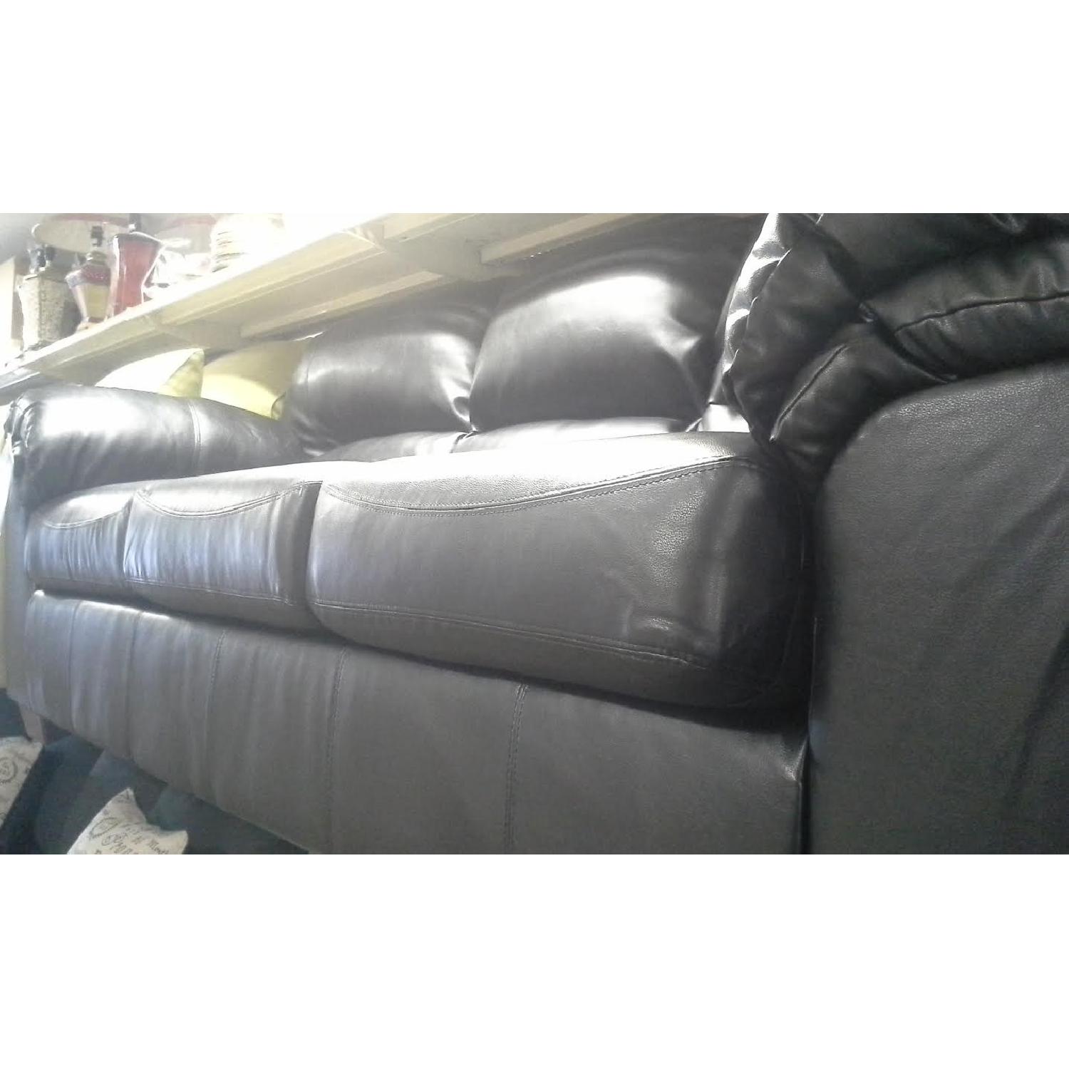 Ashley's Faux Leather Sofa - image-2