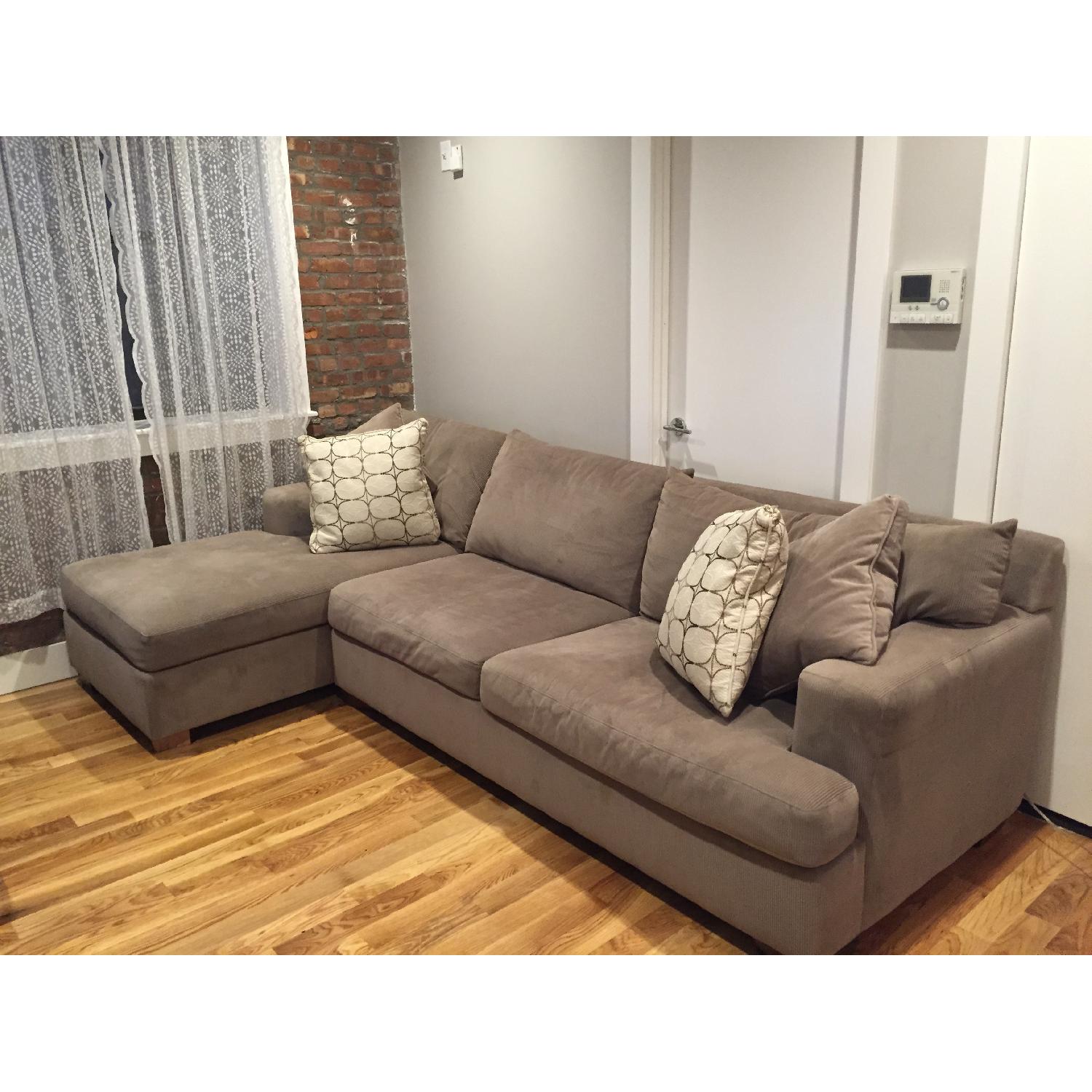 Raymour & Flanigan Sectional Sofa and Pillows - image-1