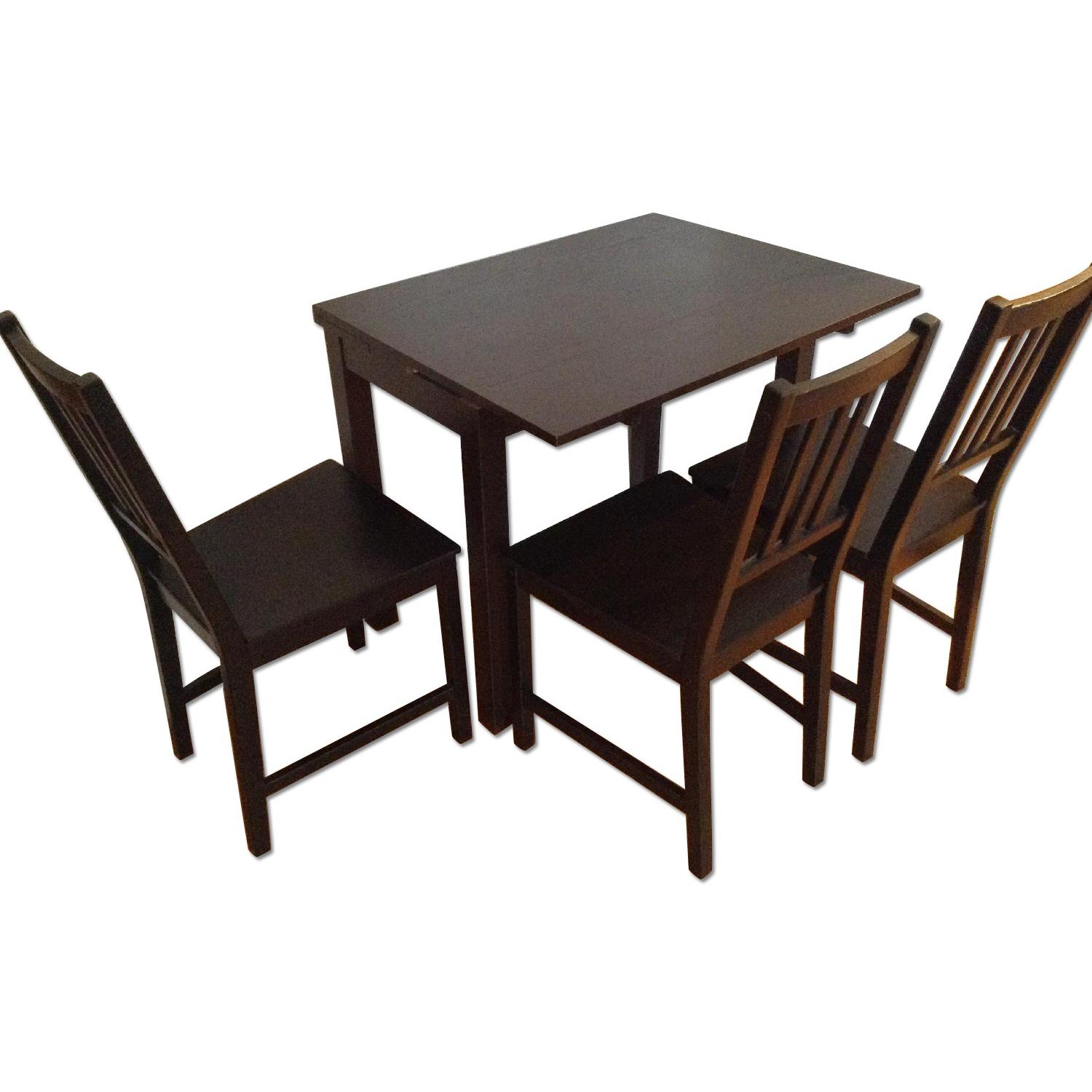 Ikea Dark Brown Bjursta Dining Table w/ 3 Chairs AptDeco