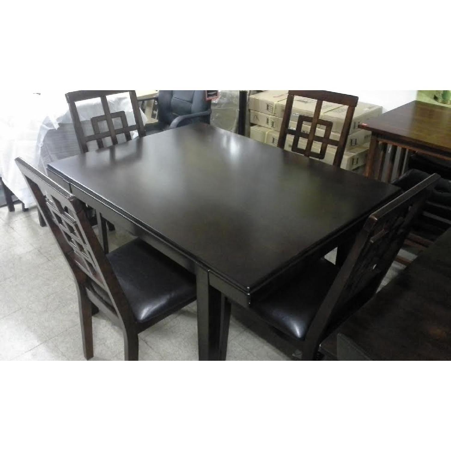 Ashley's Rectangle Dining Table w/ 4 Chairs - image-1