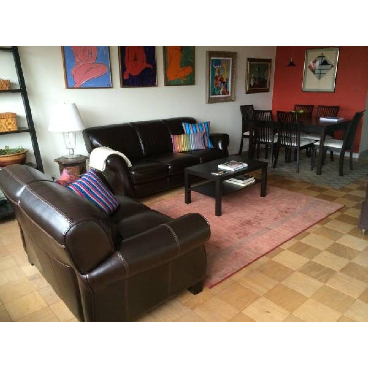 Raymour & Flanigan Dark Brown Leather Sofa + Loveseat Set - image-1