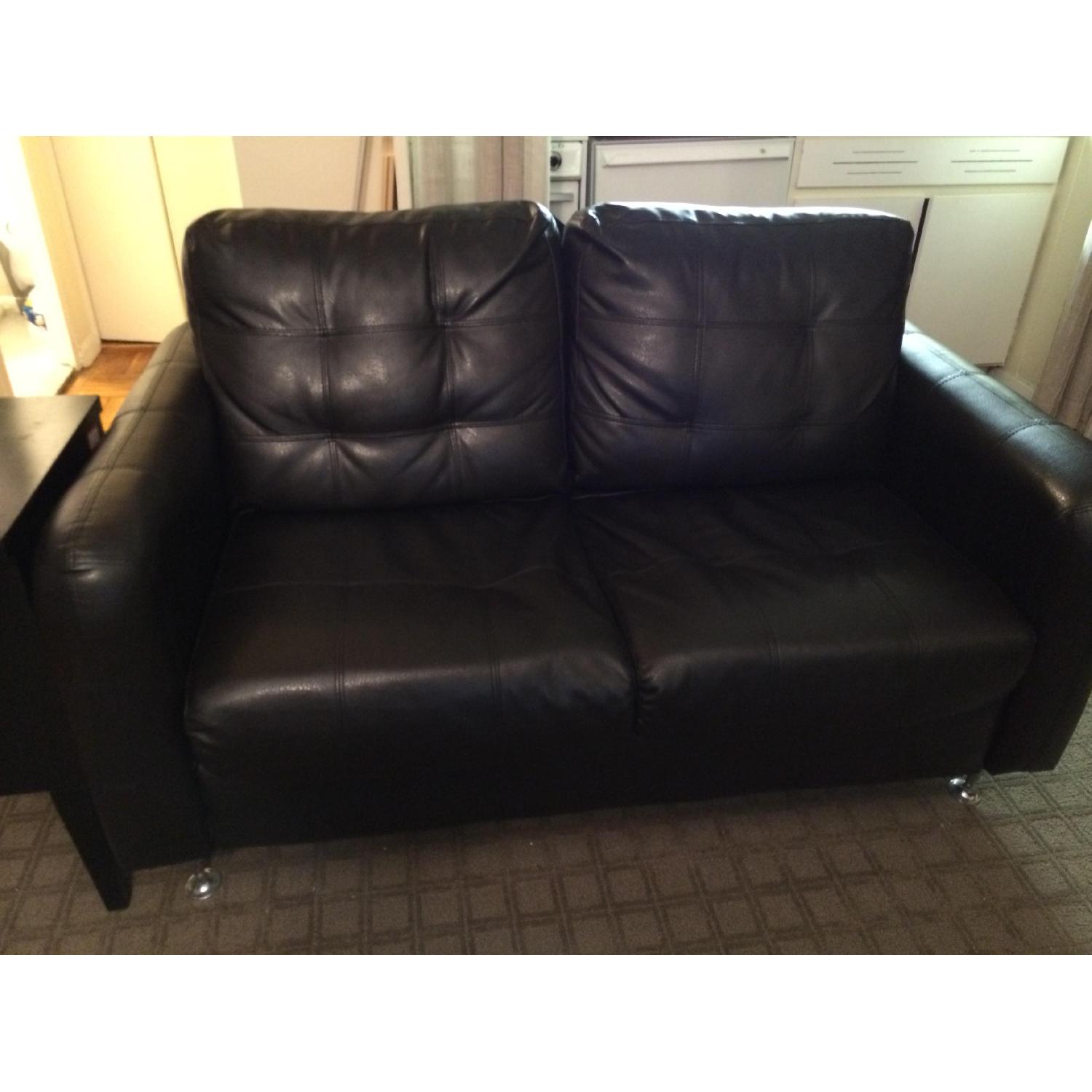Pillesima Bonded Dark Brown Leather Loveseat - image-1