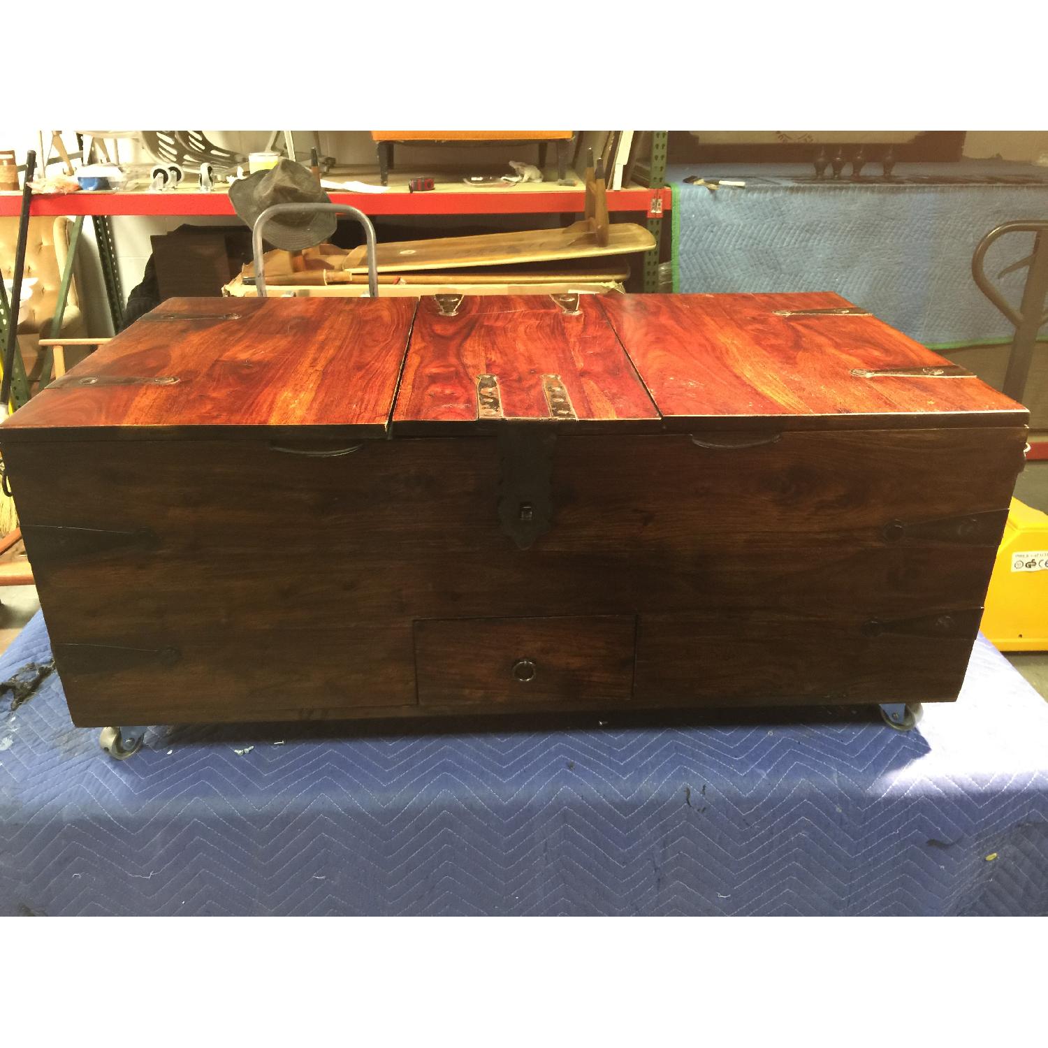 Vintage Wooden Chest with Metal Wheels - image-1