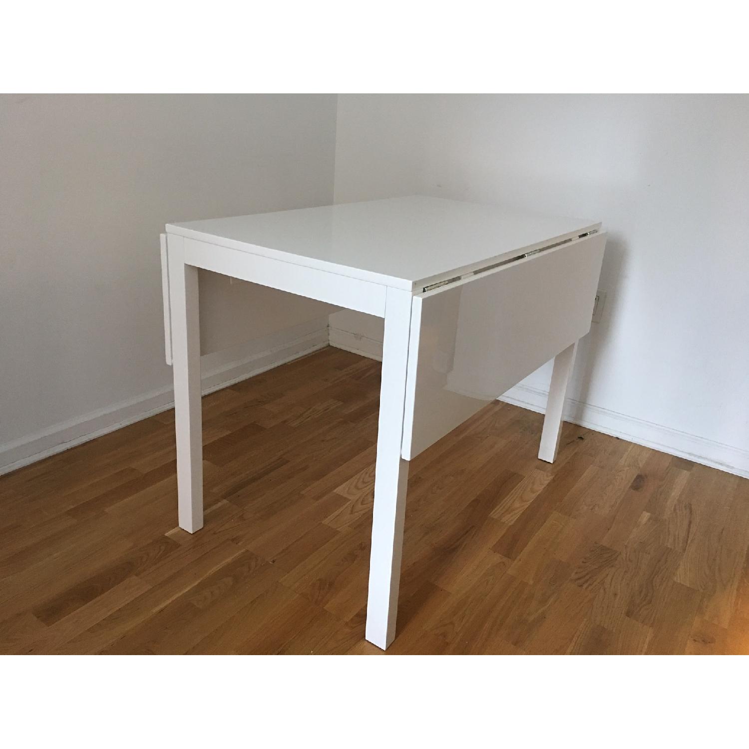 CB2 Extendable White Dining Table - image-2