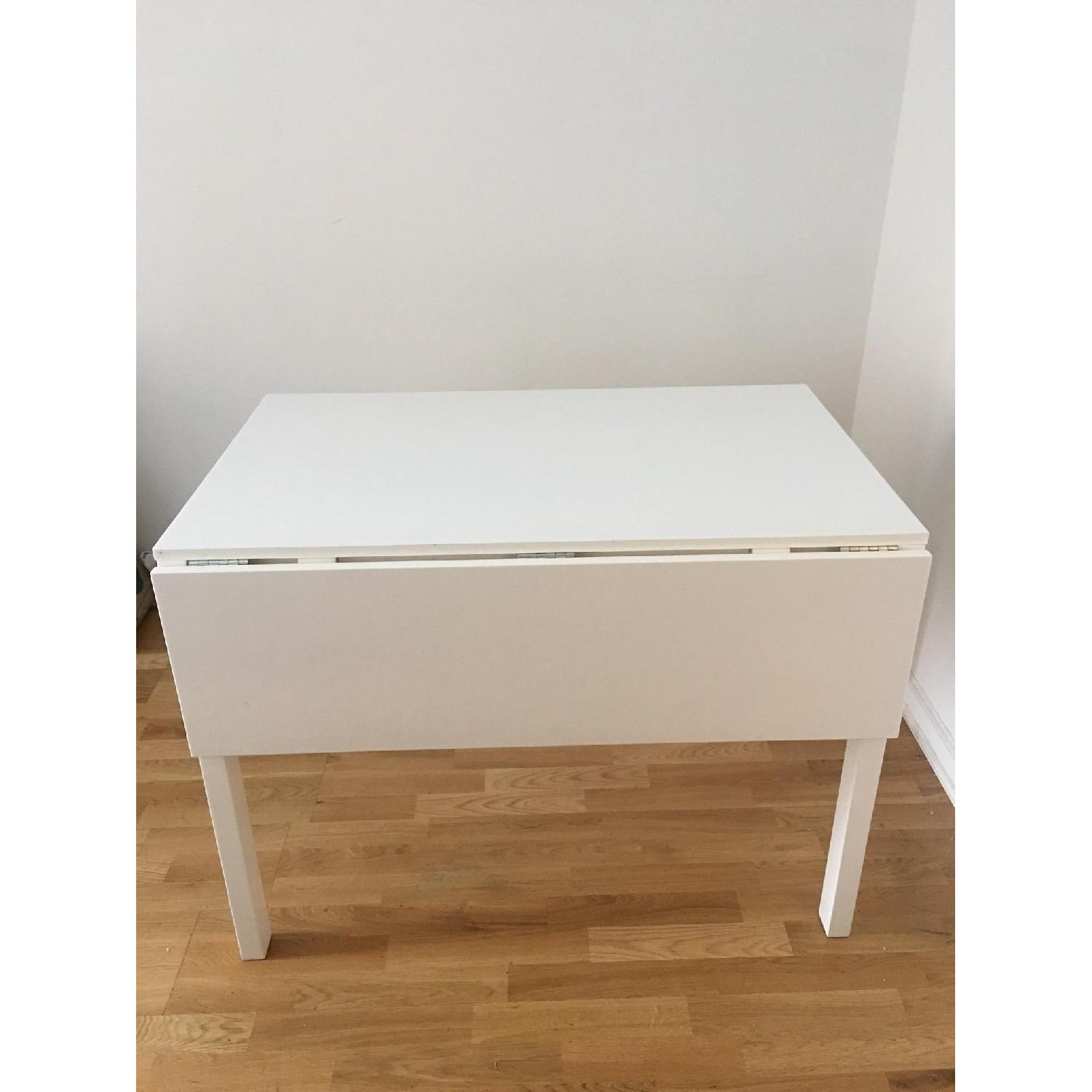 CB2 Extendable White Dining Table - image-3