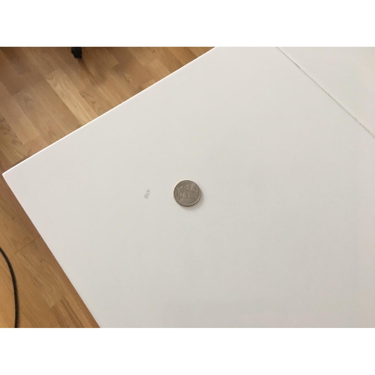 CB2 Extendable White Dining Table - image-5