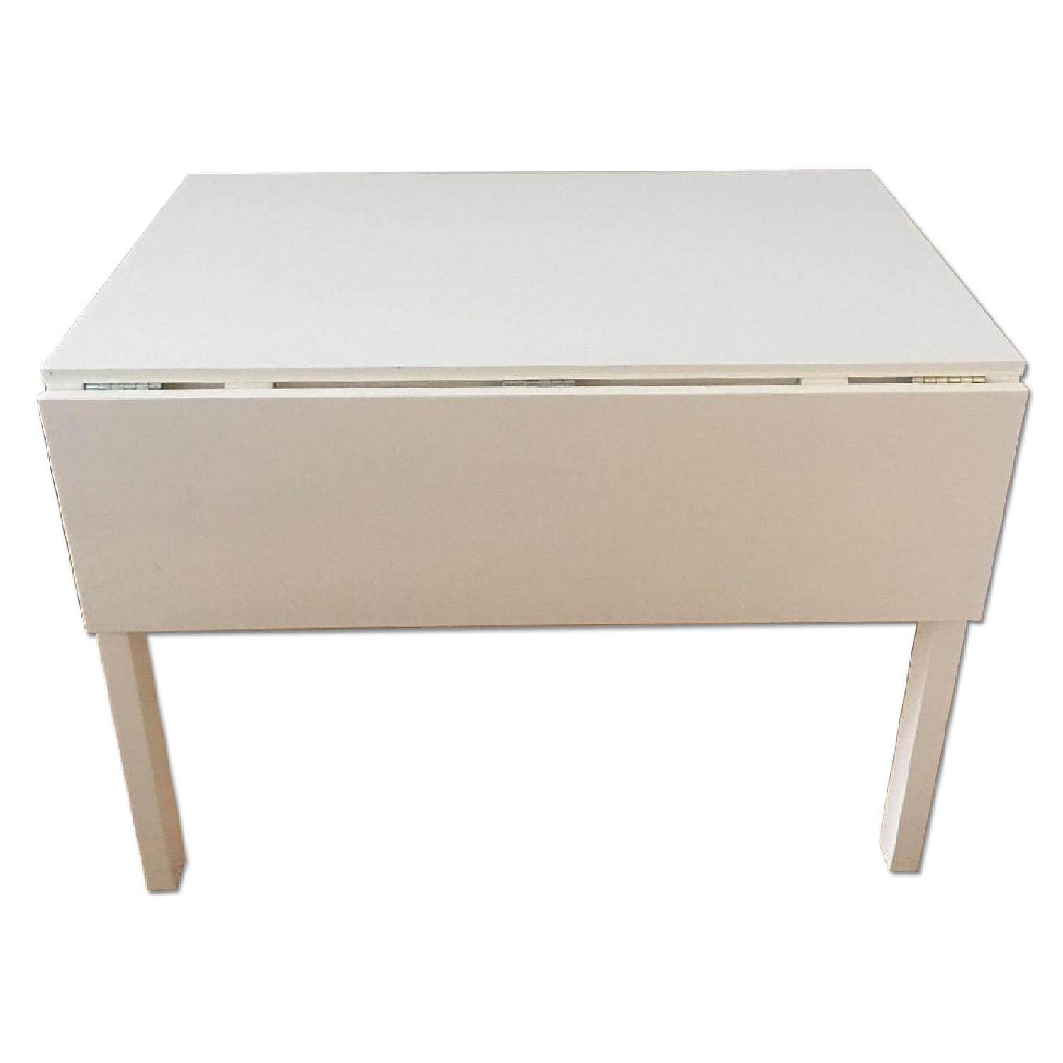 CB2 Extendable White Dining Table - image-6