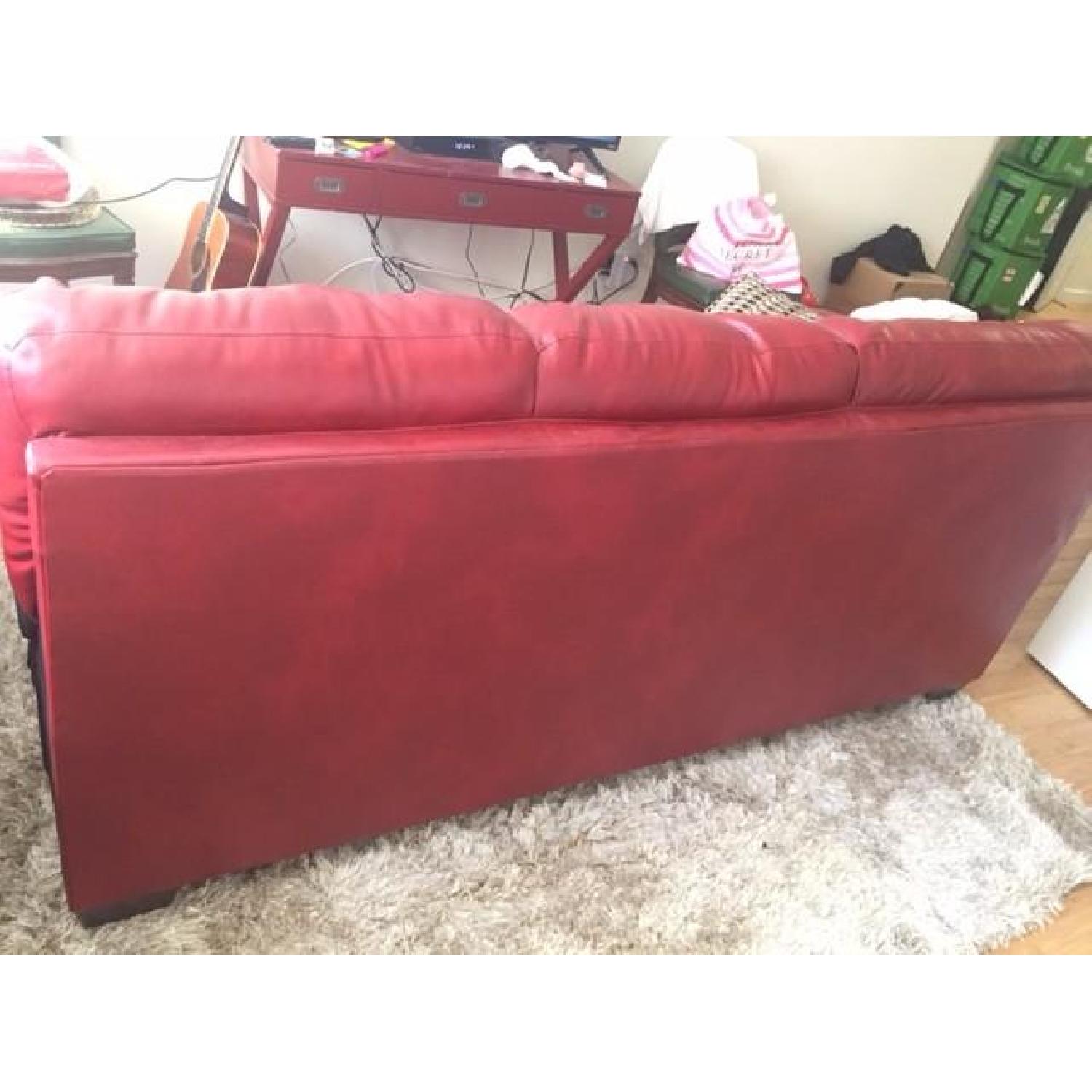 Ashley's Alliston Tufted Durablend Sectional in Red Salsa - image-2