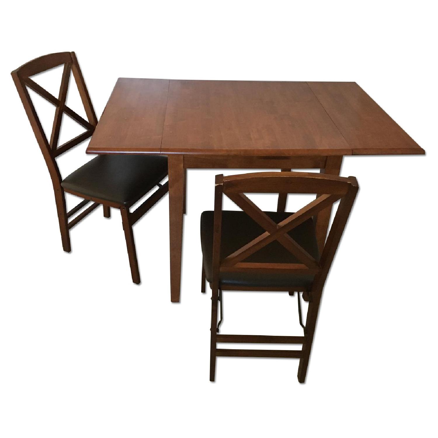Solid Wood Extendable Dining Table w/ 4 Folding Dining Chairs AptDeco