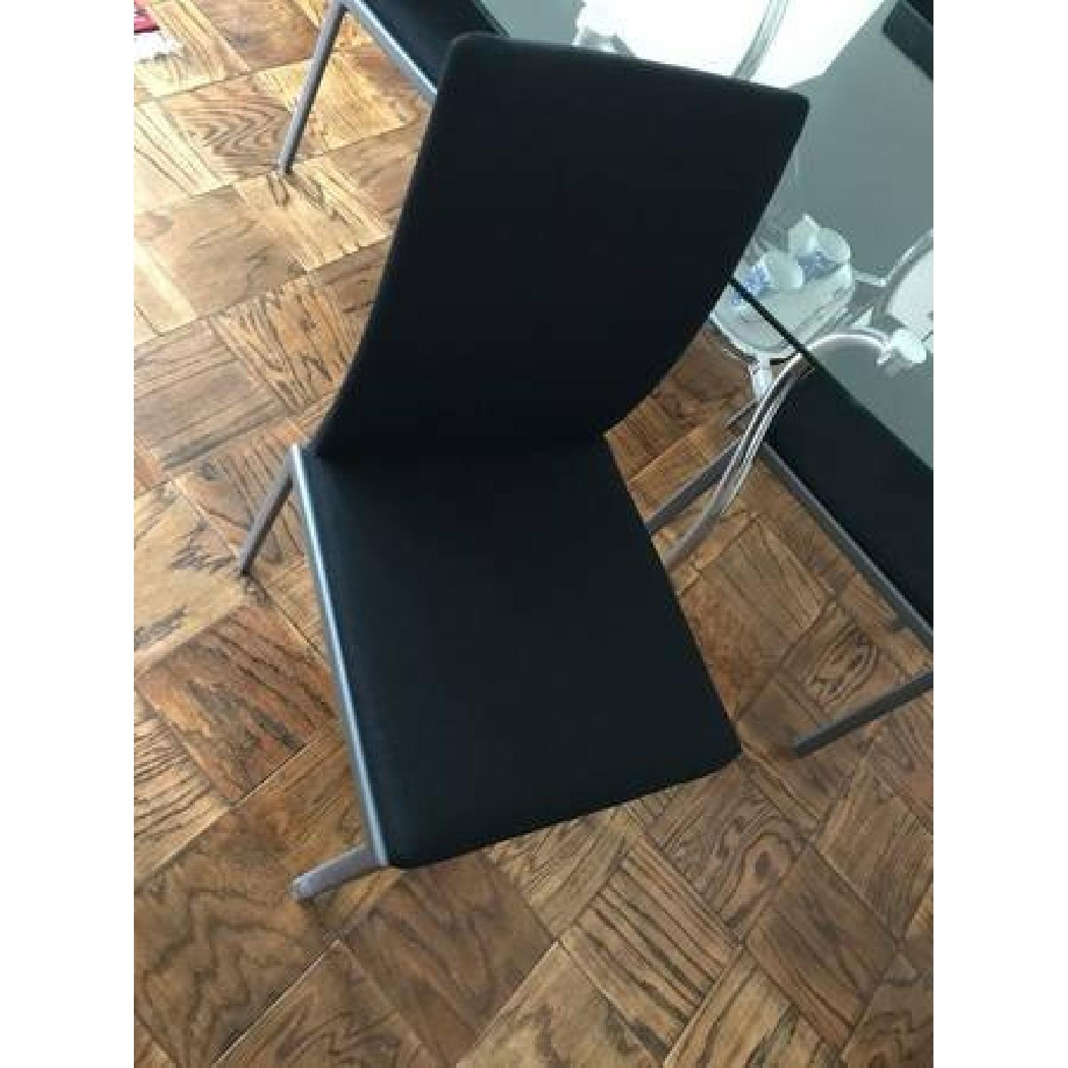 Glass Top/Metal Base Dining Table w/ 4 Black Fabric Chairs - AptDeco