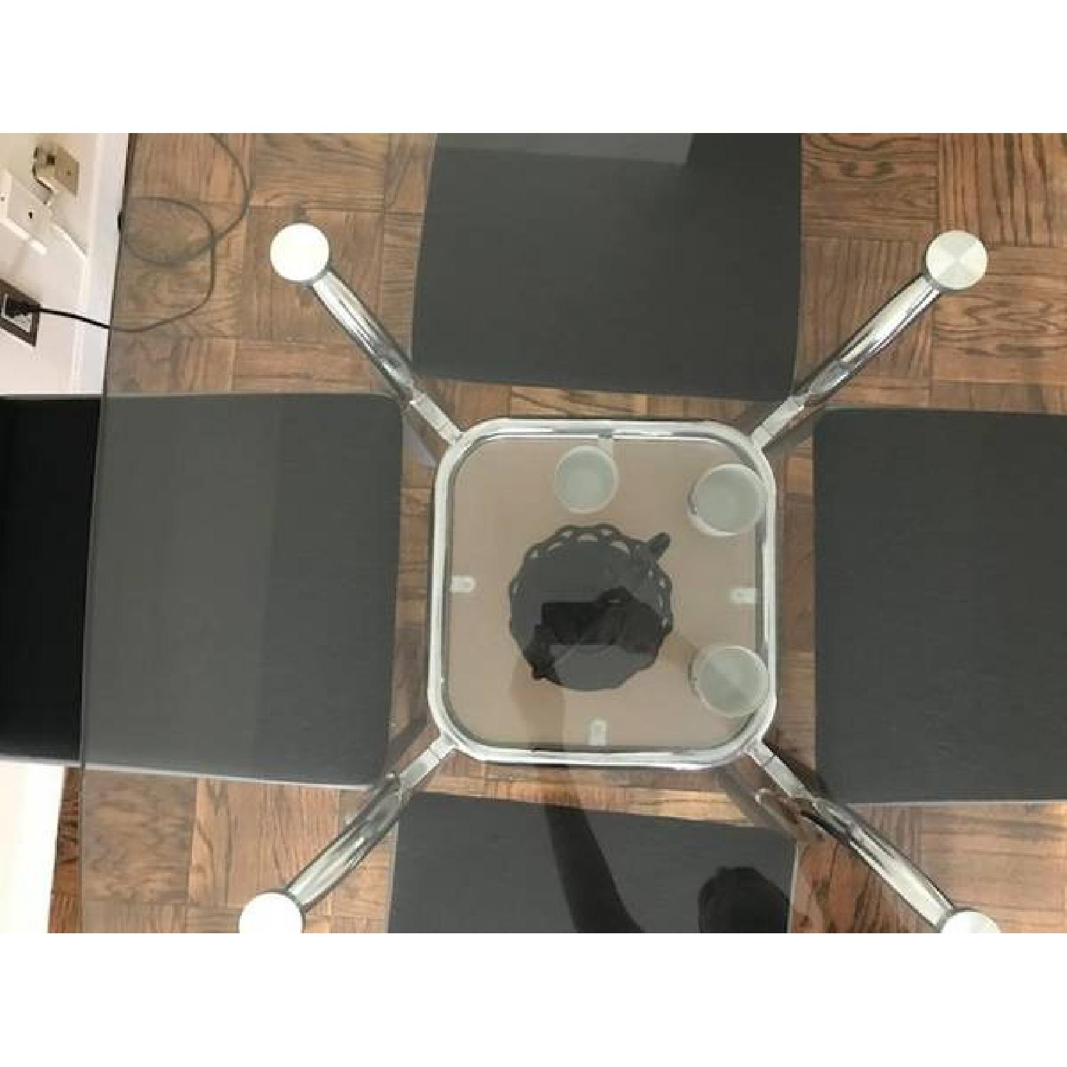 Glass Top/Metal Base Dining Table w/ 4 Black Fabric Chairs - AptDeco