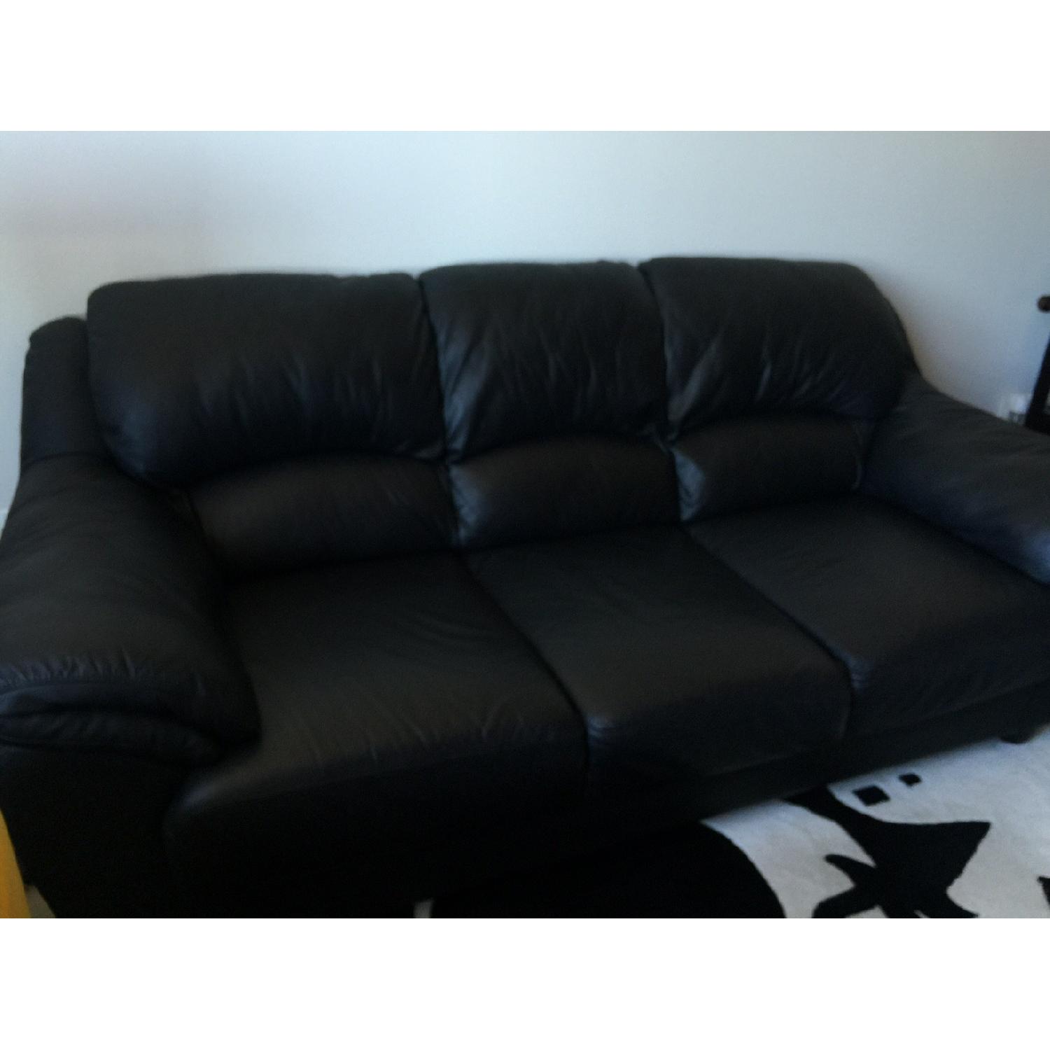 Raymour & Flanigan Black Leather 3 Cushion Sofa - image-4