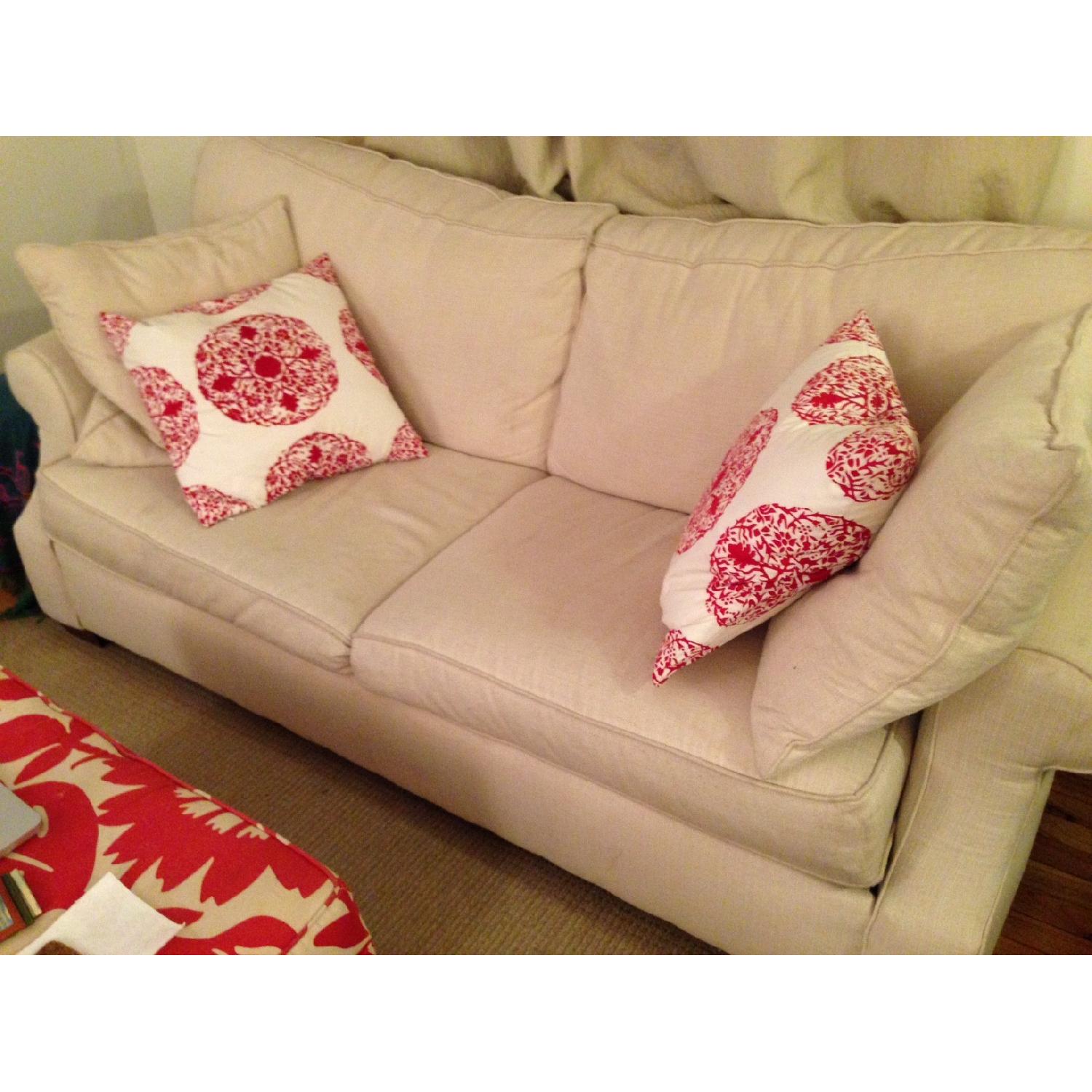 Jennifer Convertibles Beige Upholstered Pull-Out Couch - image-1