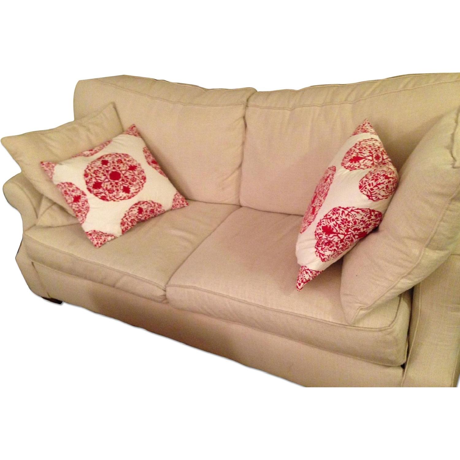 Jennifer Convertibles Beige Upholstered Pull-Out Couch - image-0
