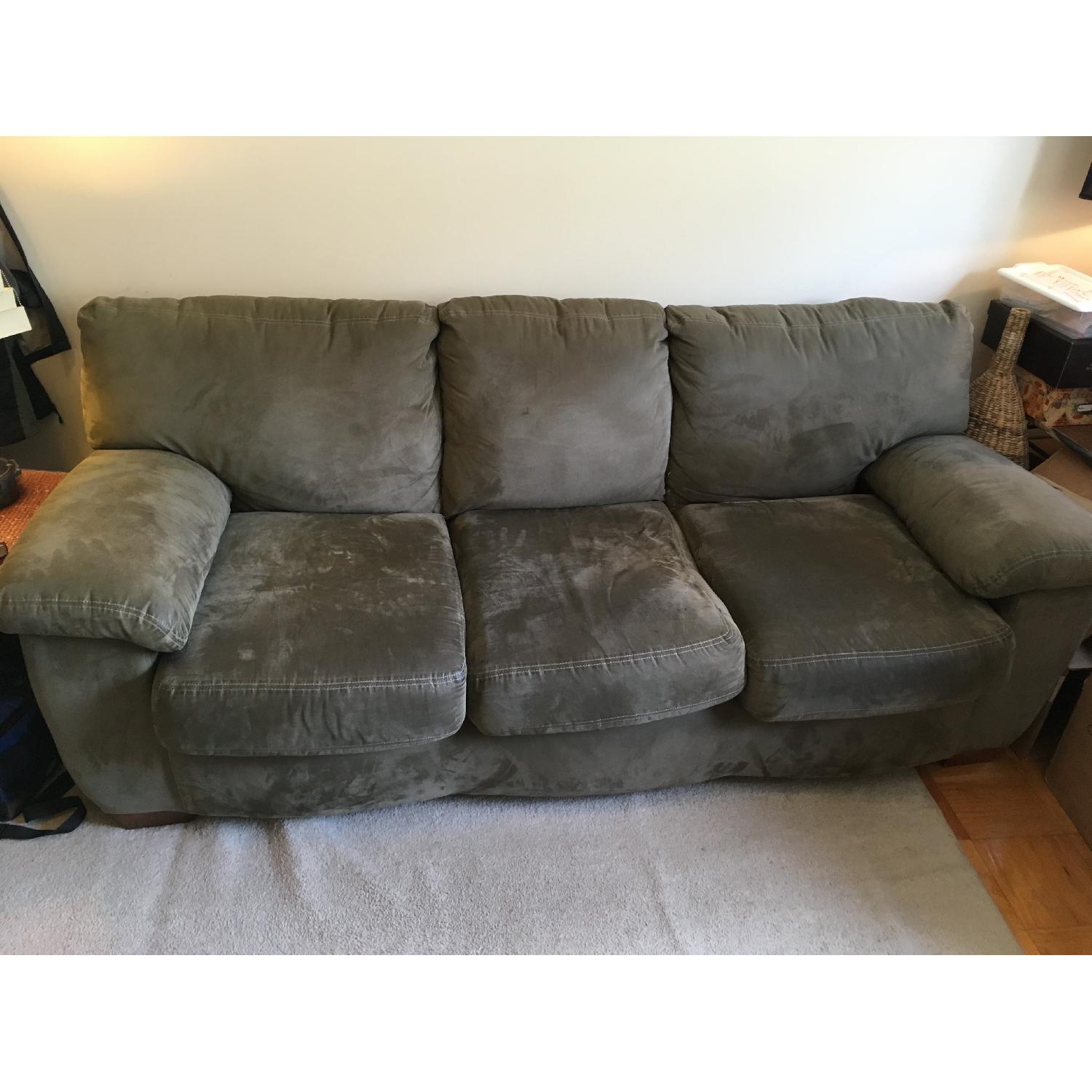 Ashley S Sage Green Microfiber Couch Aptdeco