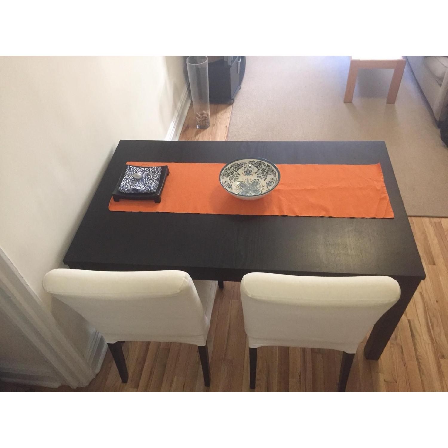 Ikea Bjursta Extendable Dining Table in Black - image-8