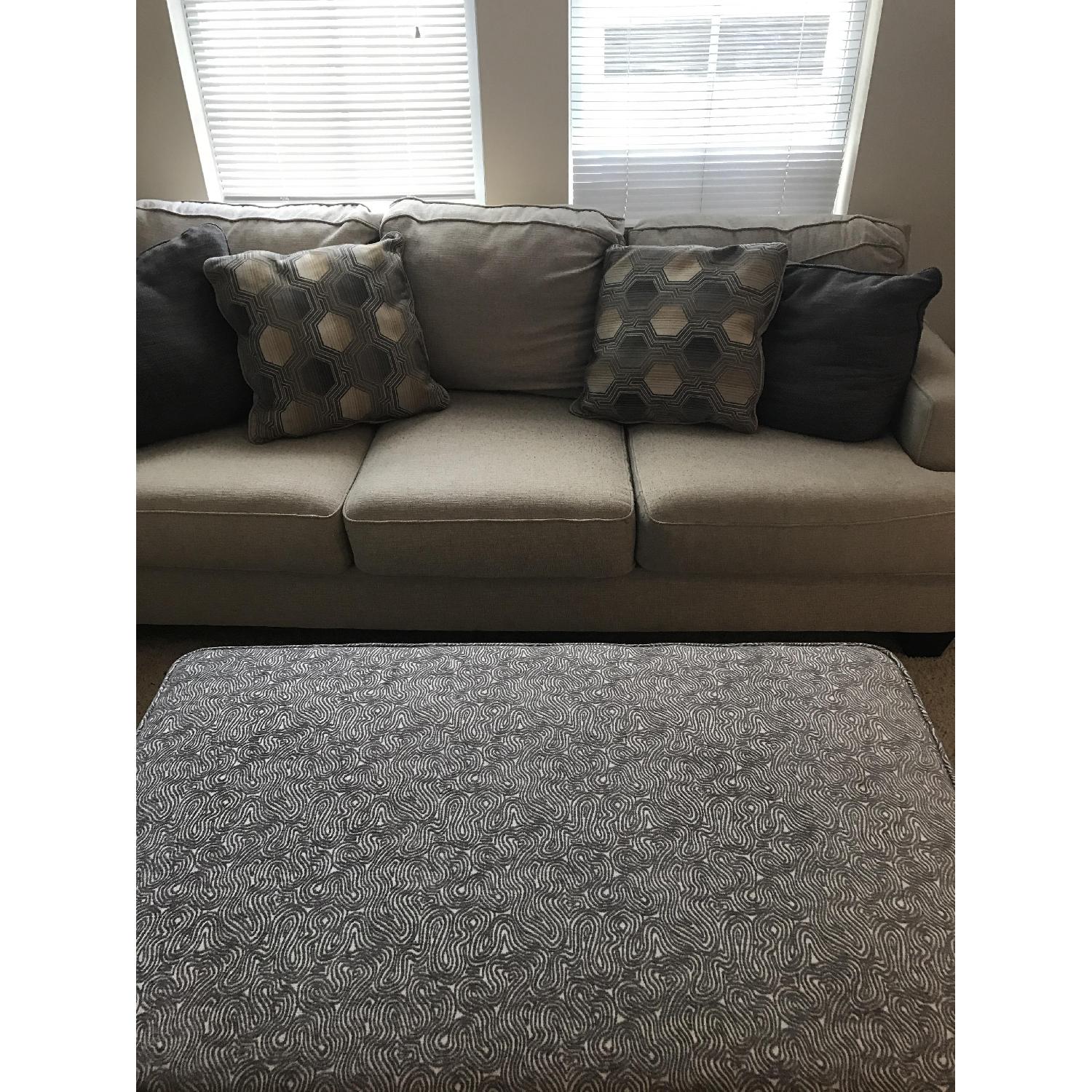 Ashley's Benchcraft Sofa & Ottoman - image-1