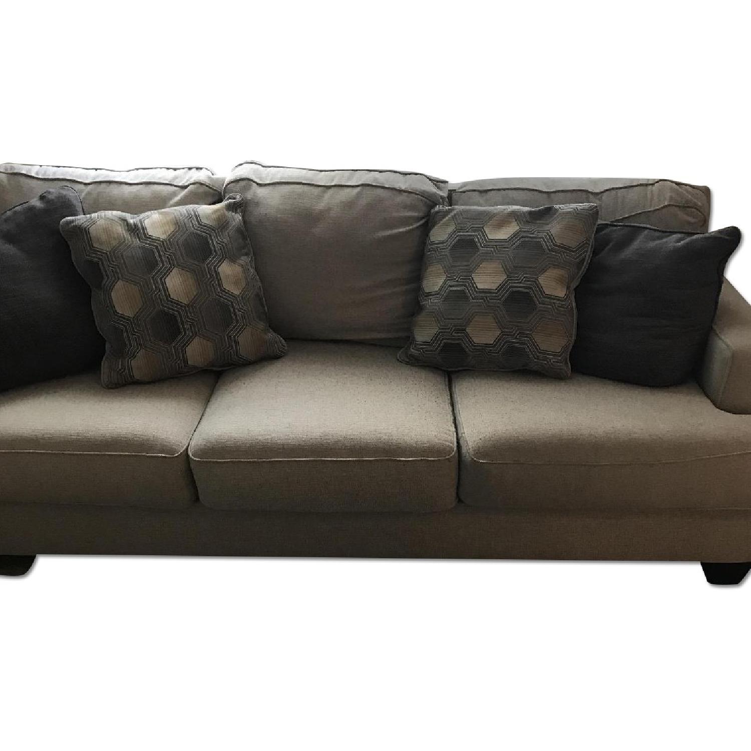 Ashley's Benchcraft Sofa & Ottoman - image-0