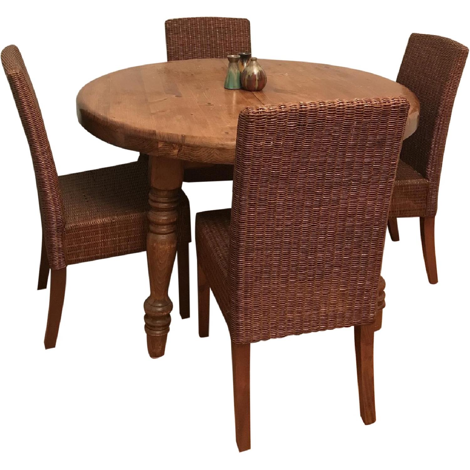 Antique Dining Room Table w/ 4 Wicker Chairs - AptDeco