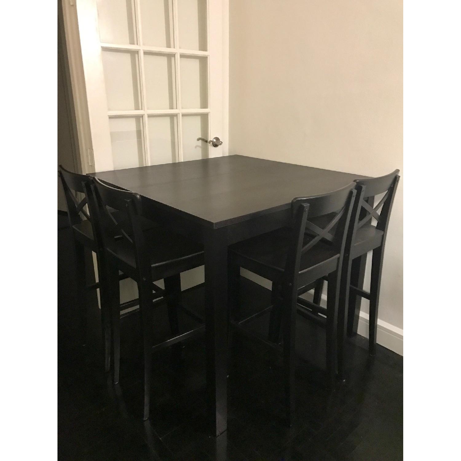 Ikea Bjursta Bar Table w/ 4 Ikea Ingolf Bar Stools AptDeco