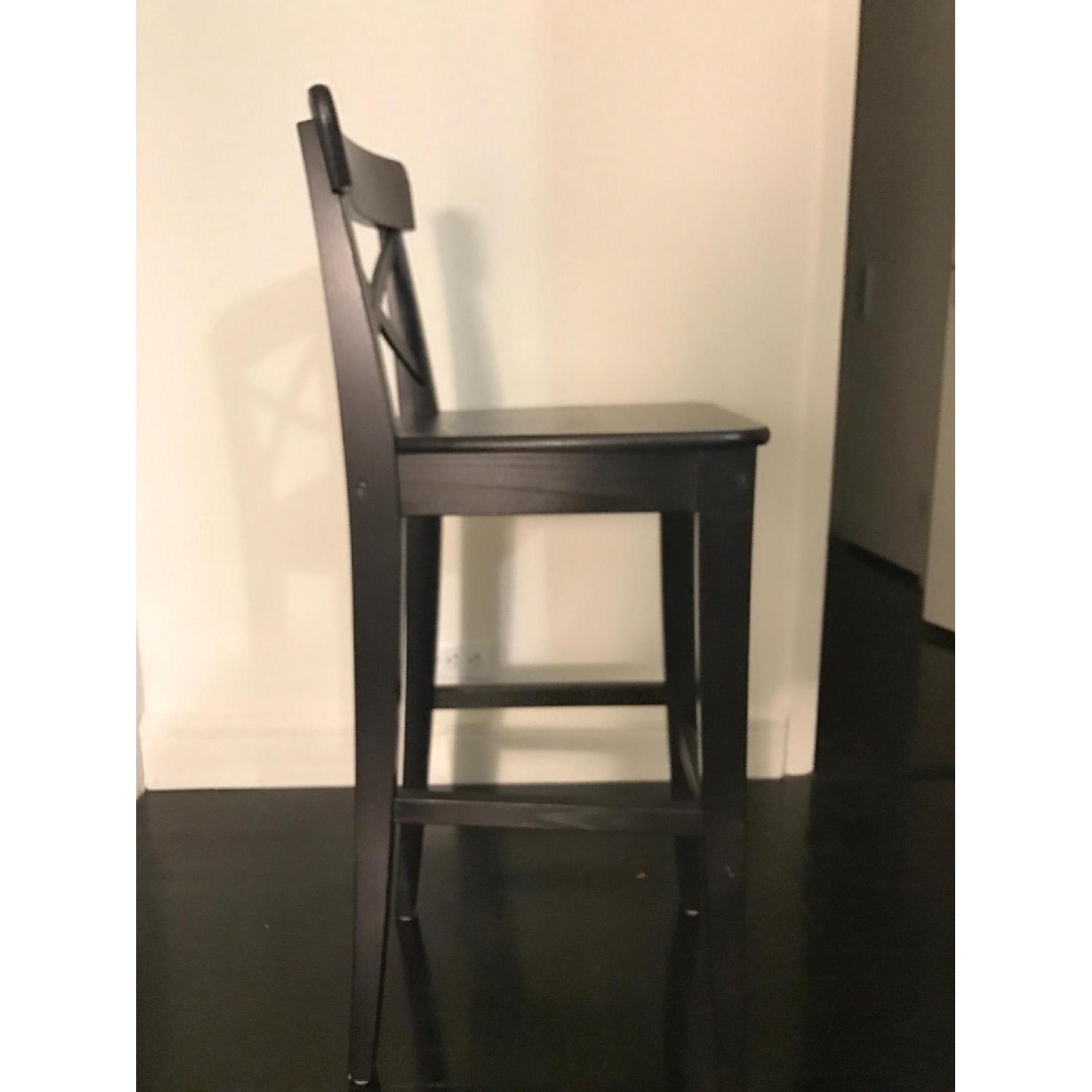 Ikea Bjursta Bar Table w/ 4 Ikea Ingolf Bar Stools AptDeco