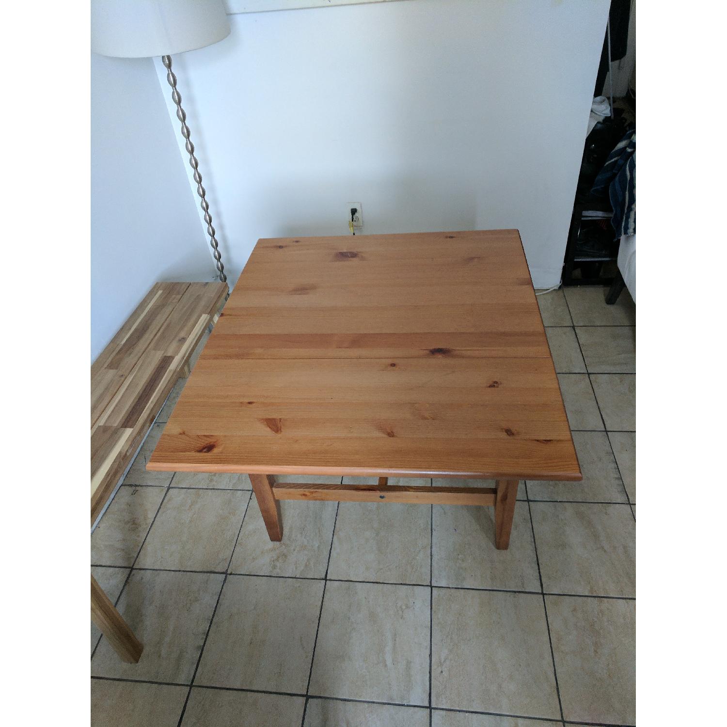 Wooden Dining Table w/ Adjustable Leaf - AptDeco