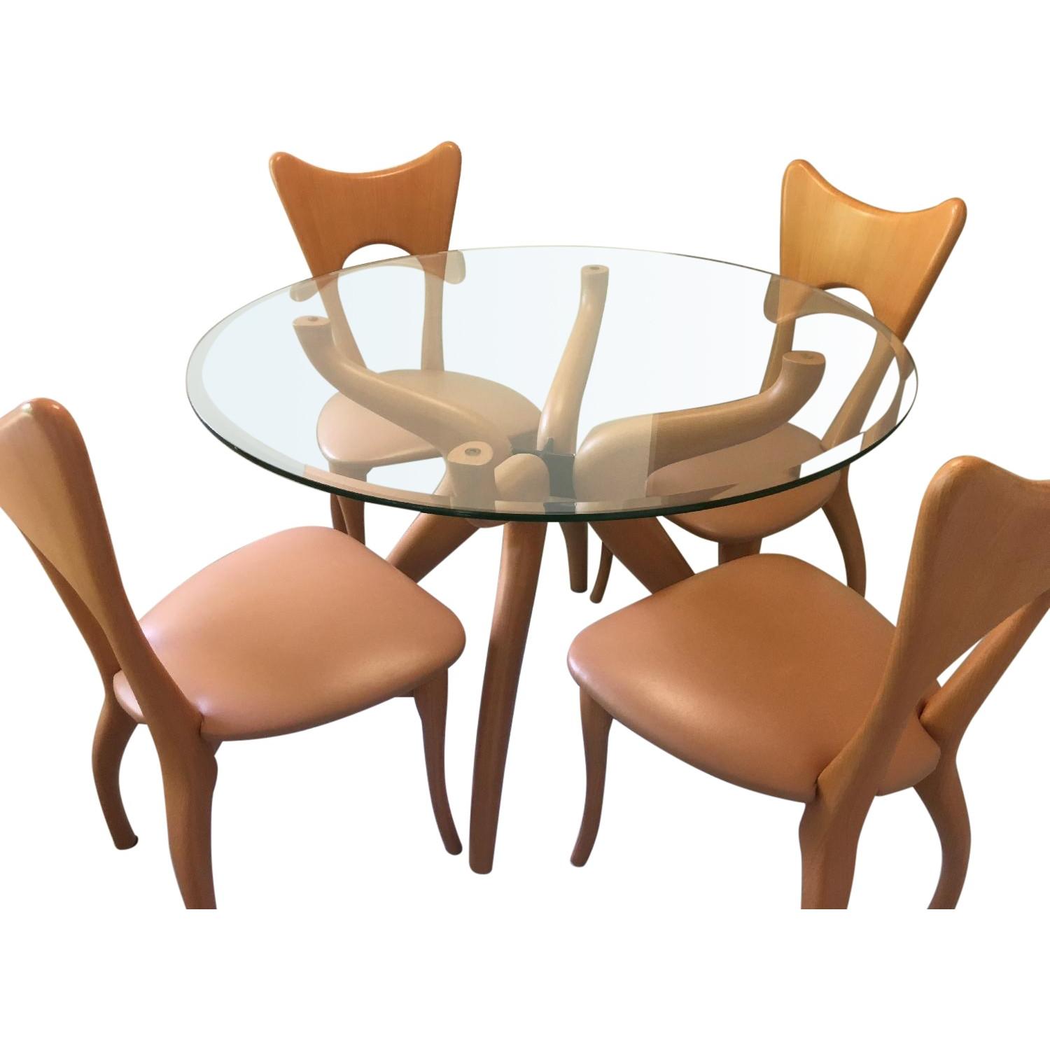 Glass Round Dinning Table w/ 4 Leather Chairs - AptDeco